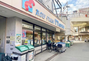 万代小阪店まで552m