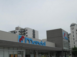 万代魚崎店まで873m