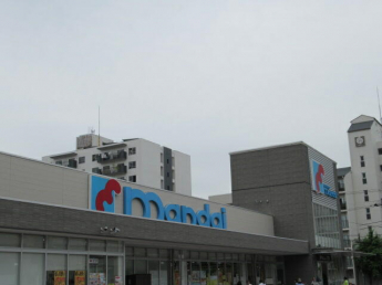 万代魚崎店まで873m