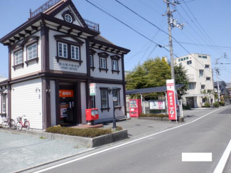 松山鴨川郵便局まで832m