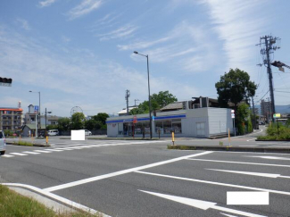 ローソン松山小栗店まで596m