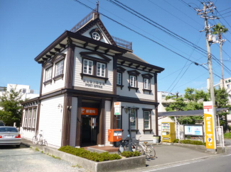 松山鴨川郵便局まで307m