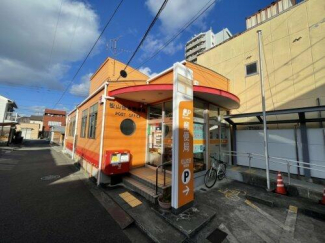 松山住吉郵便局まで590m