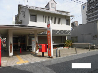 道後郵便局まで990m