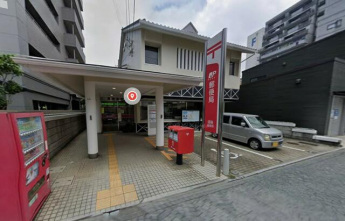 道後郵便局まで899m