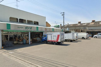 スーパー田中まで990m