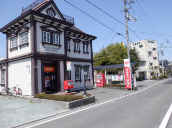 松山鴨川郵便局まで334m