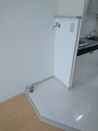 洗濯機置場になります。