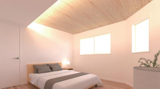 天然木の温かみを感じる約７．４帖のベッドルーム柔らかな建築化